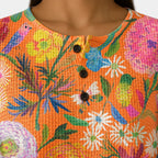 Florence | Orange Jumper with Colourful Floral Pattern