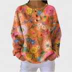 Florence | Orange Jumper with Colourful Floral Pattern